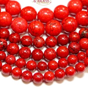 Boule magnésite rouge brillant 4-14 mm, 1 fil