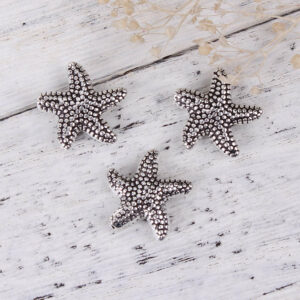 Metal bead starfish dots 14 mm, 3 pieces