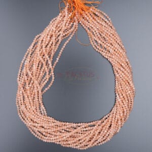 Sunstone bicone faceted approx. 3x3mm, 1 strand